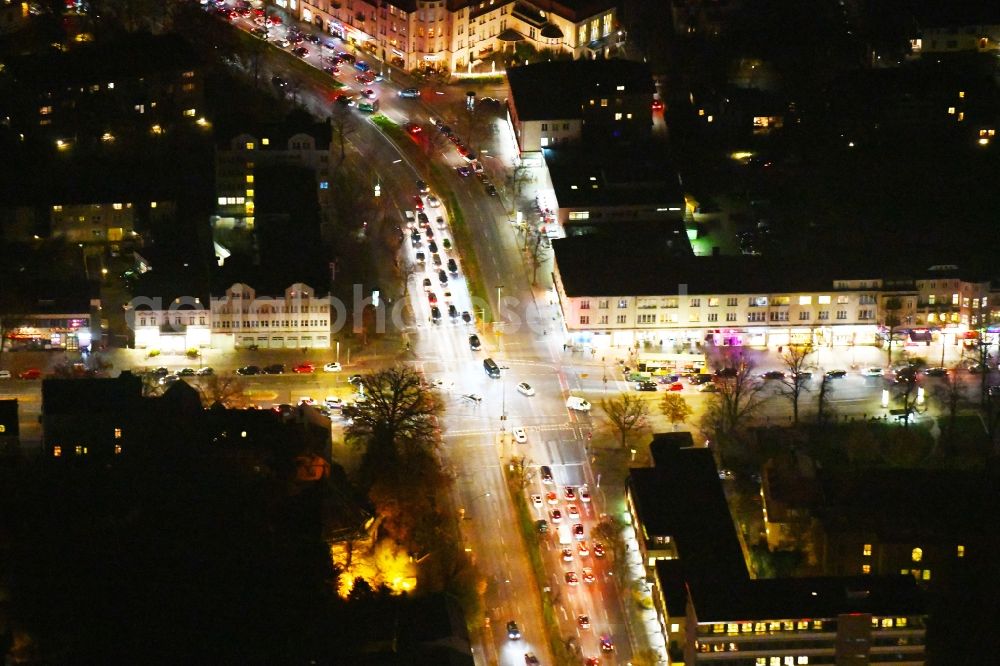 Aerial photograph at night Berlin - Night lighting Road over the crossroads Clayalleee - Teltower Damm - Berliner Strasse in the district Zehlendorf in Berlin, Germany