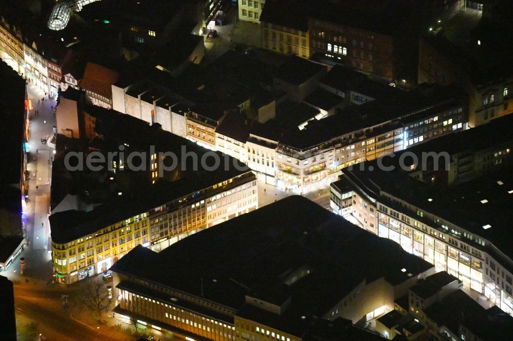 Aerial photograph at night Braunschweig - Night lighting Road over the crossroads Muenzstrasse and Damm in Stadtzentrum in Braunschweig in the state Lower Saxony, Germany