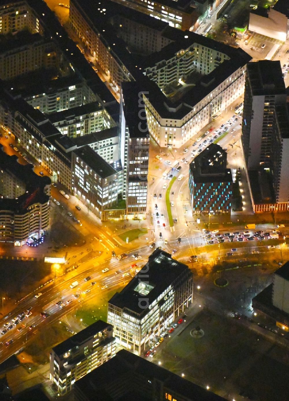 Aerial image at night Berlin - Night lighting Road over the crossroads Niederwallstrasse - Leipziger Strasse - Seydelstrasse - Axel-Springer-Strasse in the district Mitte in Berlin, Germany