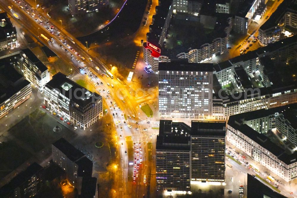 Aerial image at night Berlin - Night lighting Road over the crossroads Niederwallstrasse - Leipziger Strasse - Seydelstrasse - Axel-Springer-Strasse in the district Mitte in Berlin, Germany