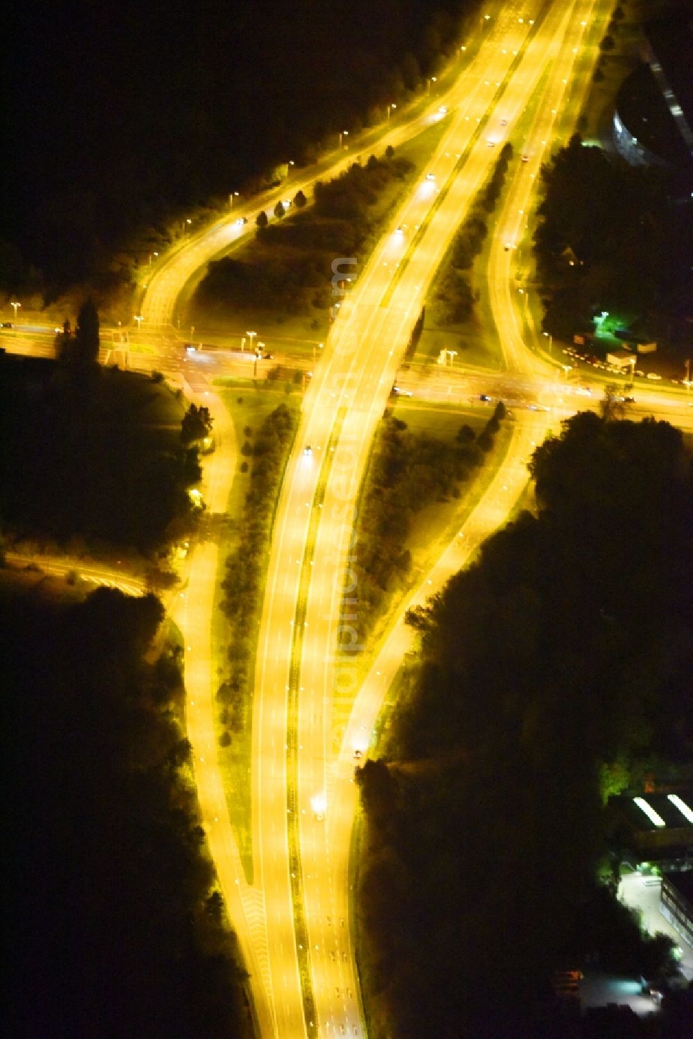 Aerial image at night Rostock - Night lighting Road over the crossroads F103 - F105 in Rostock in the state Mecklenburg - Western Pomerania, Germany