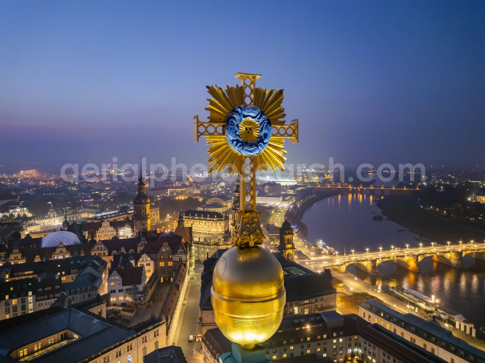 Dresden at night from the bird perspective: Night lighting dome cross on the church building Frauenkirche Dresden on the Neumarkt in the old town - center of the city center in the district of Altstadt in Dresden in the federal state of Saxony, Germany