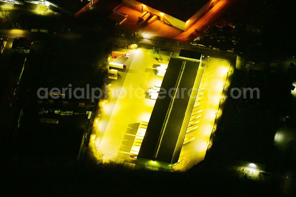 Homberg (Efze) at night from above - Night lighting warehouses and forwarding building of CTL Cargo Trans Logistik AG in Homberg (Efze) in the state Hesse, Germany