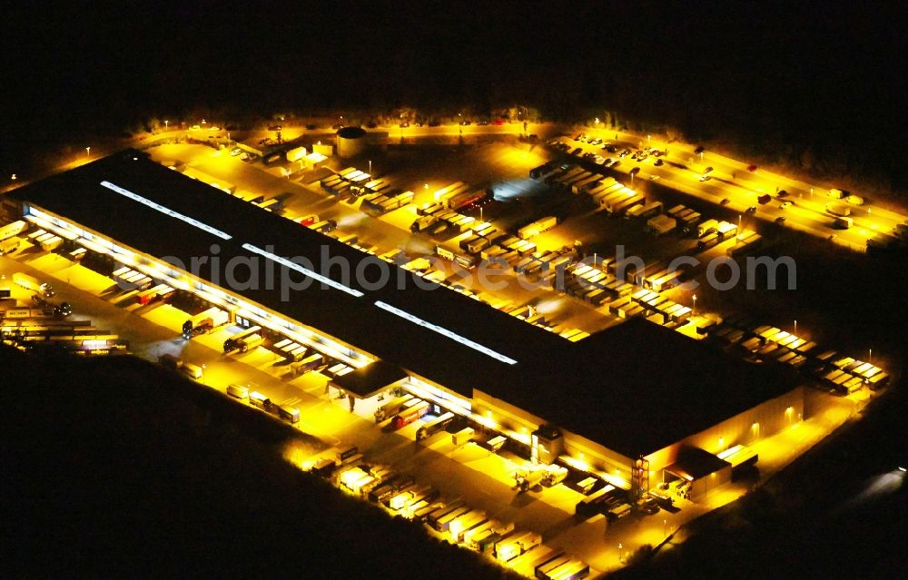 Osnabrück at night from above - Night lighting Warehouses and forwarding building Heinrich Koch Internationale Spedition GmbH & Co. KG on Fuerstenauer Weg in Osnabrueck in the state Lower Saxony, Germany