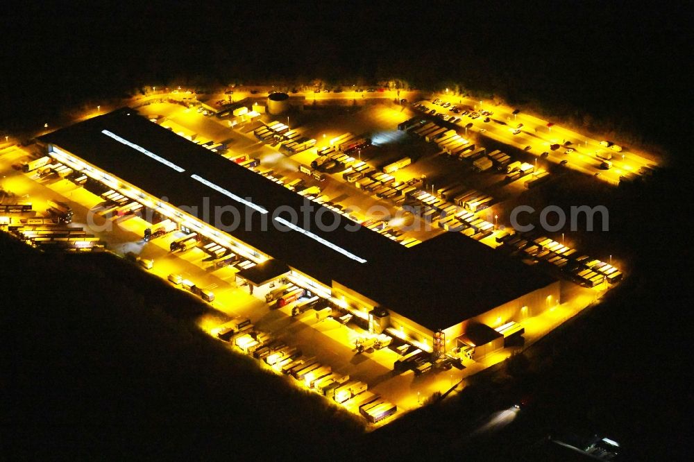 Osnabrück at night from the bird perspective: Night lighting Warehouses and forwarding building Heinrich Koch Internationale Spedition GmbH & Co. KG on Fuerstenauer Weg in Osnabrueck in the state Lower Saxony, Germany