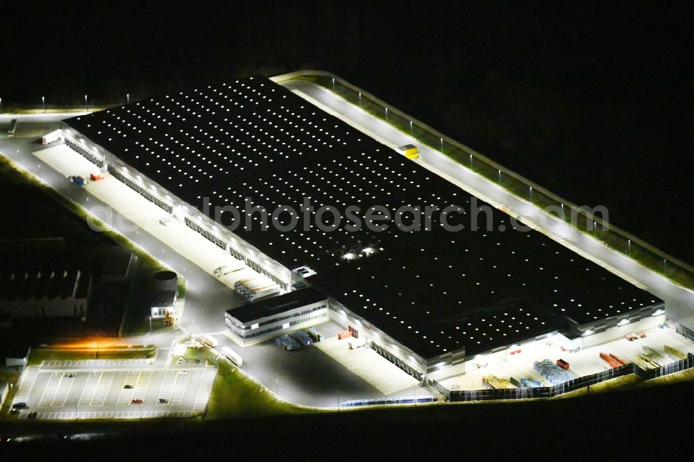 Aerial photograph at night Eggolsheim - Night lighting Warehouses and forwarding building of Lidl Vertriebs GmbH & Co. KG in Eggolsheim in the state Bavaria, Germany