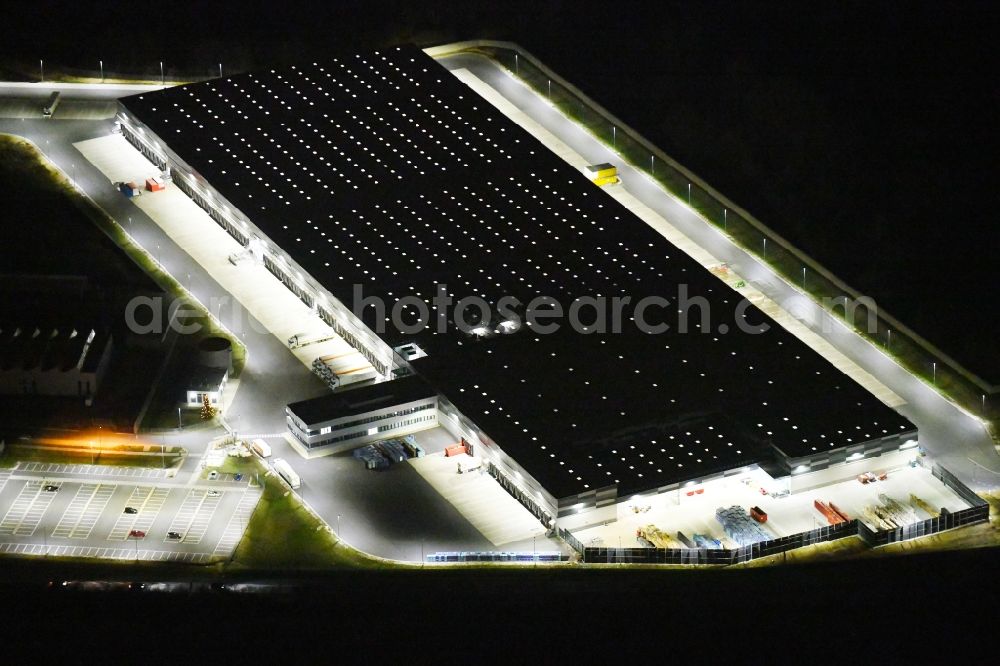 Aerial image at night Eggolsheim - Night lighting Warehouses and forwarding building of Lidl Vertriebs GmbH & Co. KG in Eggolsheim in the state Bavaria, Germany