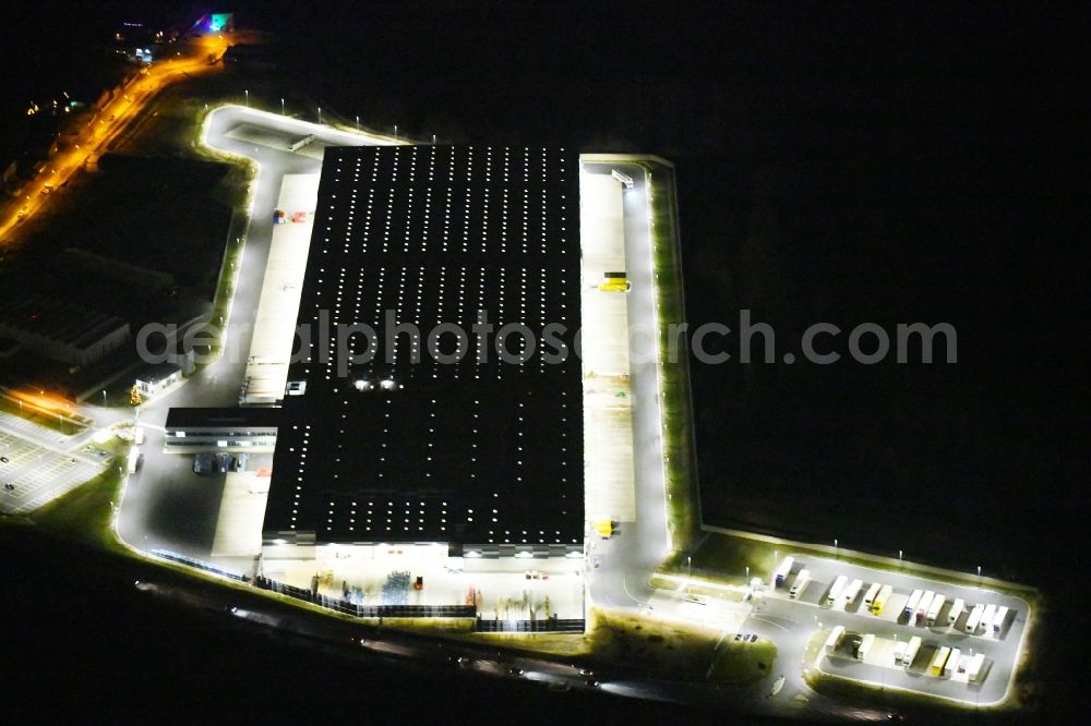 Eggolsheim at night from above - Night lighting Warehouses and forwarding building of Lidl Vertriebs GmbH & Co. KG in Eggolsheim in the state Bavaria, Germany