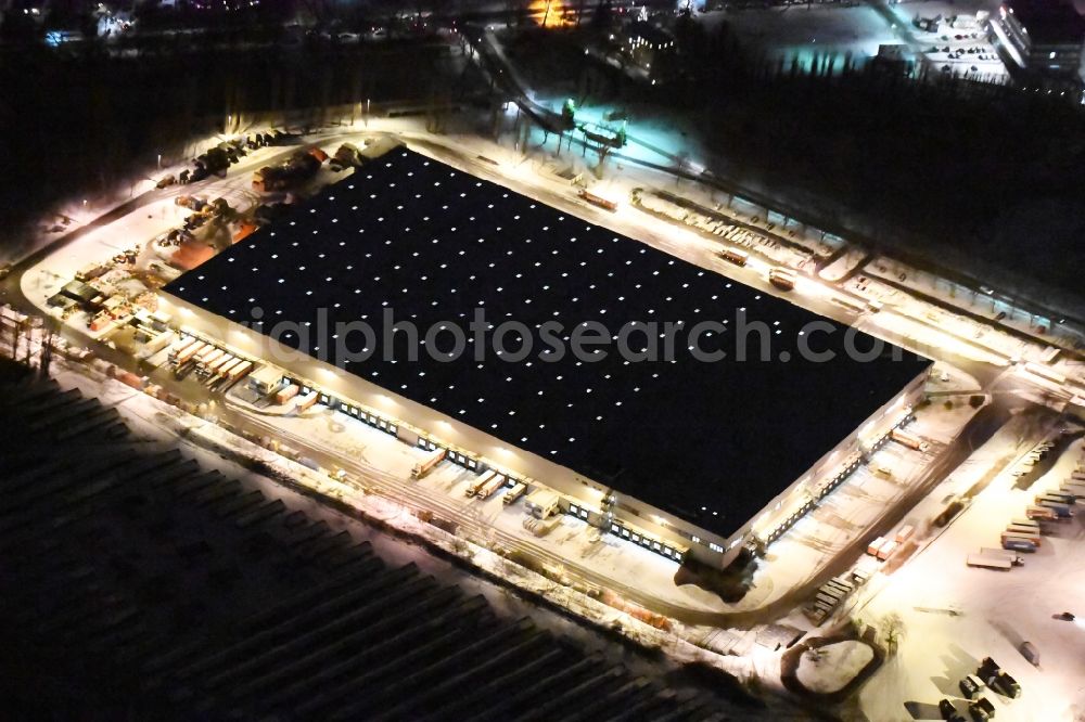 Aerial photograph at night Berlin - Night view warehouse complex-building in the industrial area Kaisers Tengelmann on the Ringstrasse in the district Mariendorf in Berlin