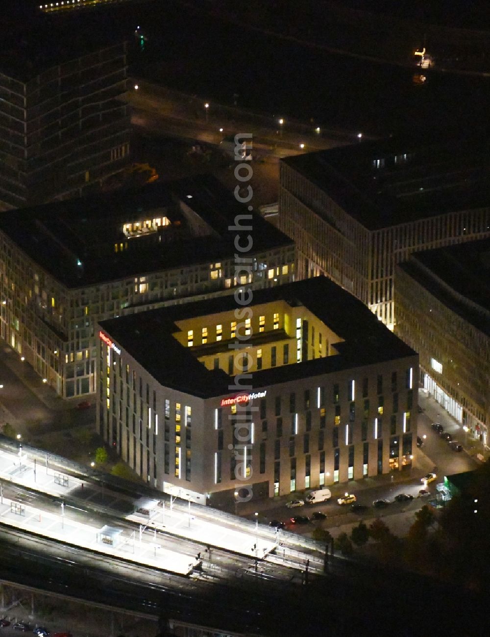 Berlin at night from above - Night lighting Lehrter Stadtquartier quarter in the Moabit part of Berlin in Germany. The quarter consists of 5 blocks which form a complex of office buildings and hotels