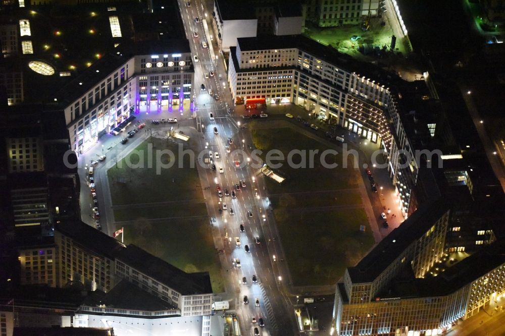 Aerial image at night Berlin - Night view ensemble space Leipziger Platz in the inner city in Berlin