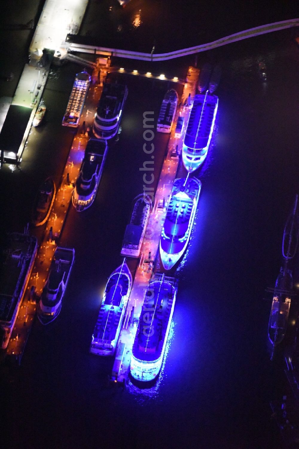 Aerial image at night Hamburg - Purple - pink night illumination of passenger ships in the harbor of Lower Elbe in the port area in Hamburg