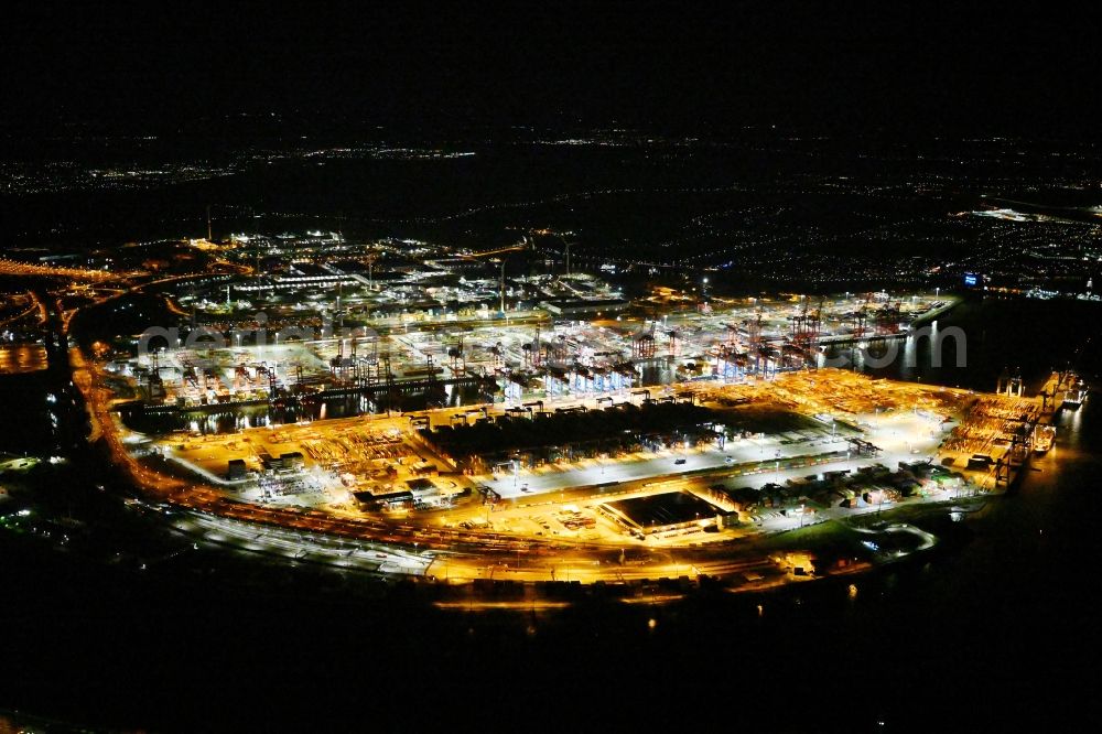 Hamburg at night from the bird perspective: Night lighting hHLA Logistics Container Terminal Burchardkai in the Port of Hamburg harbor in Hamburg in Germany