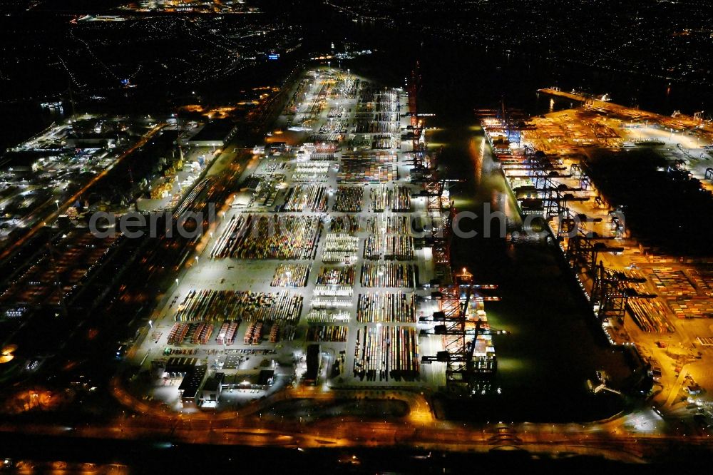 Hamburg at night from the bird perspective: Night lighting hHLA Logistics Container Terminal Burchardkai in the Port of Hamburg harbor in Hamburg in Germany