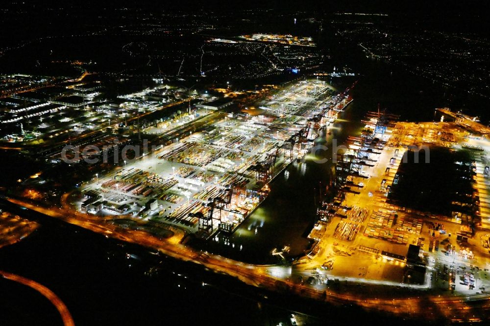 Aerial photograph at night Hamburg - Night lighting hHLA Logistics Container Terminal Burchardkai in the Port of Hamburg harbor in Hamburg in Germany