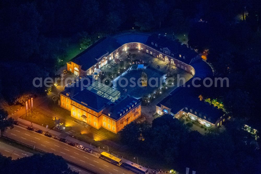 Aerial image at night Oberhausen - Night lighting Palace LUDWIGGALERIE - Schloss Oberhausen on Konrad-Adenauer-Allee in Oberhausen in the state North Rhine-Westphalia, Germany