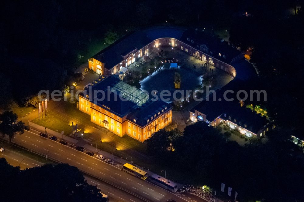 Oberhausen at night from above - Night lighting Palace LUDWIGGALERIE - Schloss Oberhausen on Konrad-Adenauer-Allee in Oberhausen in the state North Rhine-Westphalia, Germany