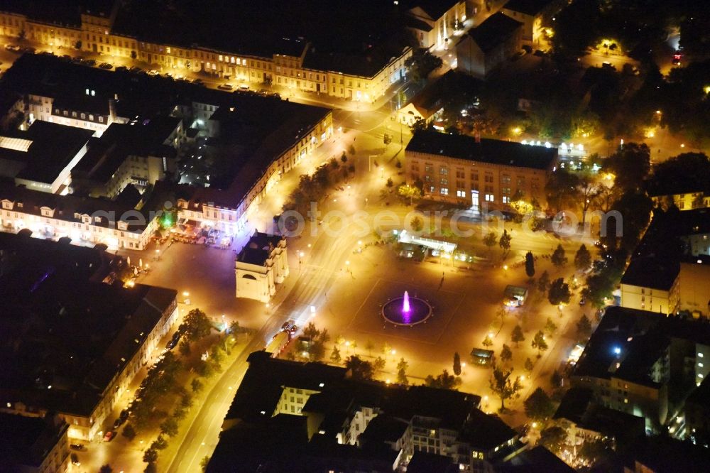 Aerial image at night Potsdam - Night view ensemble space Luisenplatz in the inner city center in Potsdam in the state Brandenburg. The square with the fountain and the Brandenburg Gate on the end of the Brandenburger Strasse