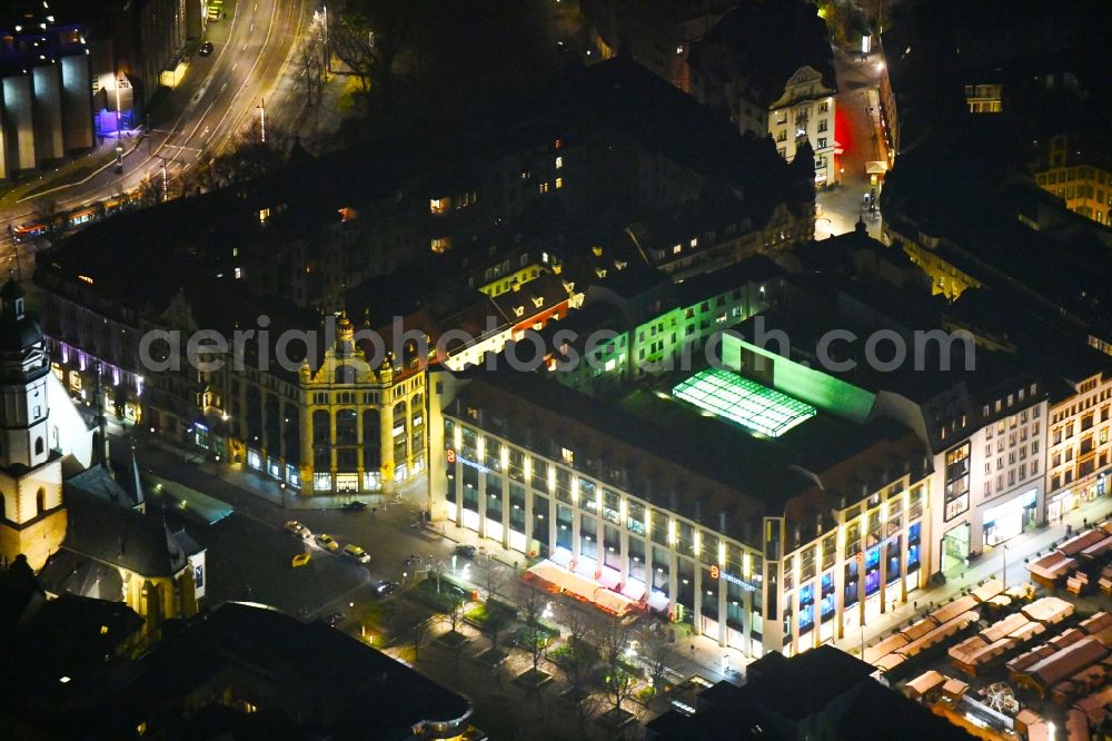 Leipzig at night from the bird perspective: Night lighting of the Marktgalerie Leipzig in Saxony in Germany