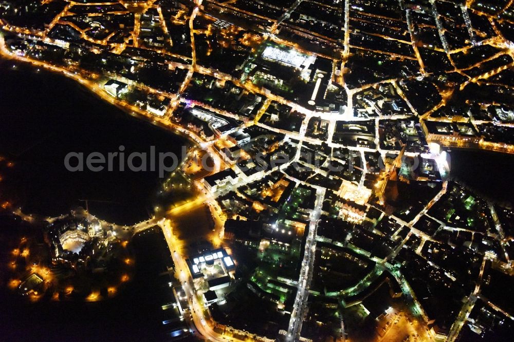 Schwerin at night from above - Night view of the downtown area of Schwerin in the state Mecklenburg - Western Pomerania. In the picture as well the castle schwerin at the Burgsee