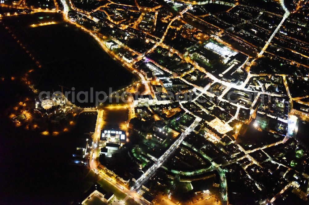 Schwerin at night from above - Night view of the downtown area of Schwerin in the state Mecklenburg - Western Pomerania. In the picture as well the castle schwerin at the Burgsee