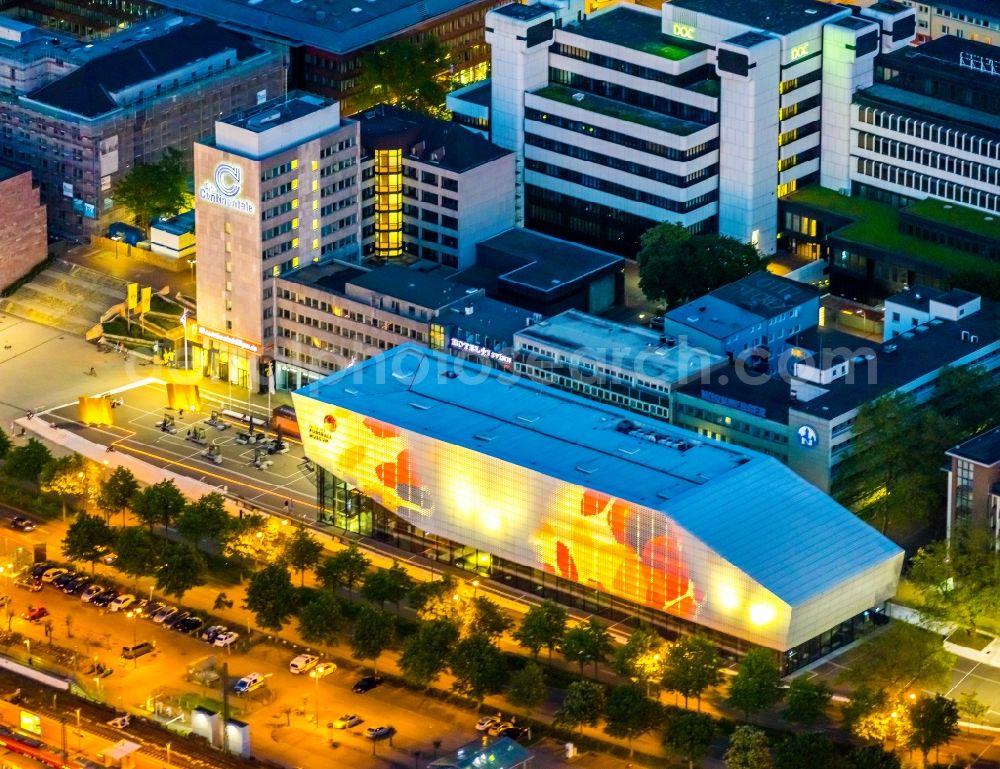 Aerial photograph at night Dortmund - Night lighting museum building ensemble Deutsches Fussballmuseum in the district City-West in Dortmund at Ruhrgebiet in the state North Rhine-Westphalia, Germany