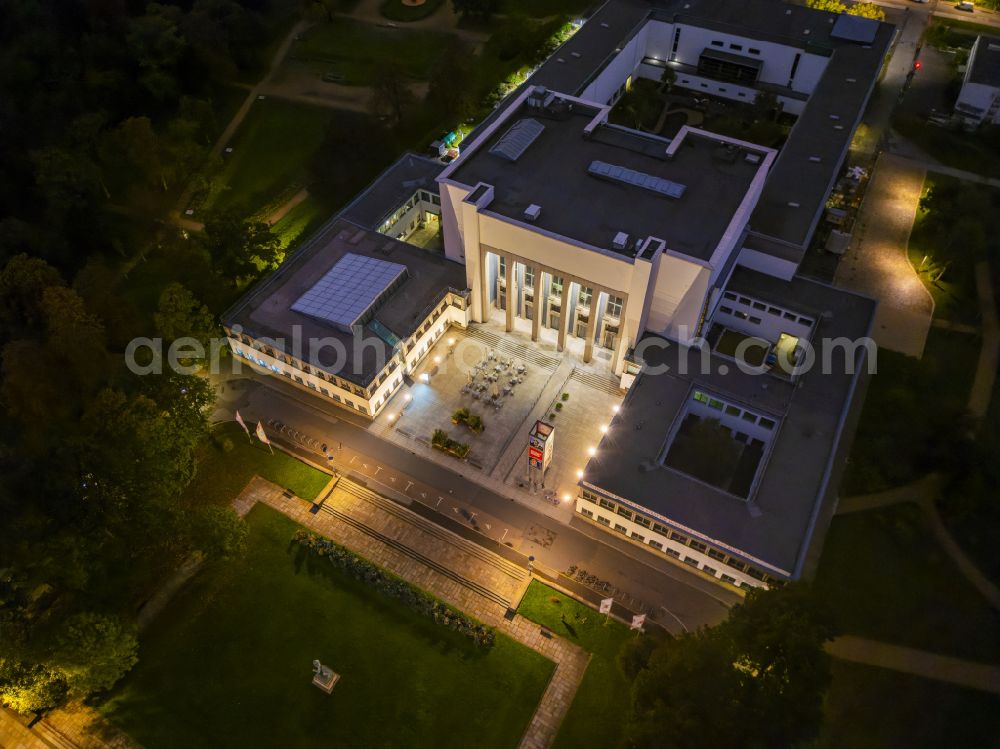 Aerial image at night Dresden - Night lighting museum building ensemble Deutsches Hygiene-Museum in the street Lingnerplatz in Dresden in the state Saxony