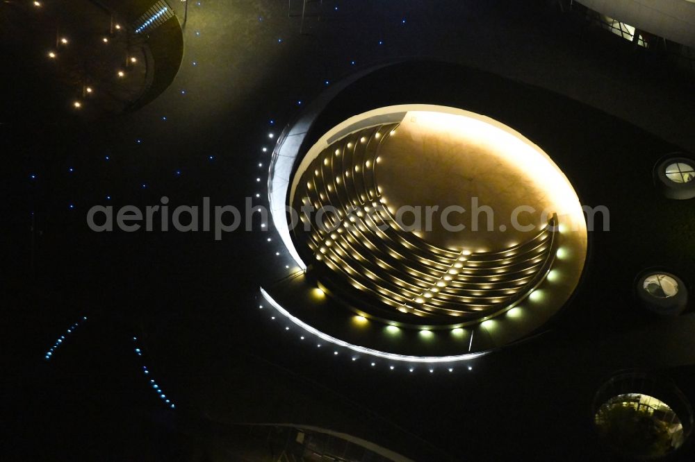 Stuttgart at night from above - Night lighting museum building ensemble Mercedes-Benz Museum on Mercedesstrasse in the district Untertuerkheim in Stuttgart in the state Baden-Wurttemberg, Germany