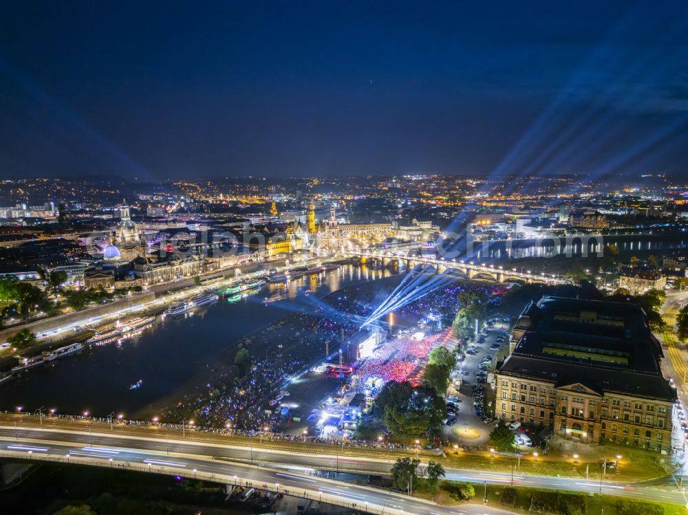 Dresden at night from above - Night lighting music concert on the open-air stage Film Nights on the Elbe - Kaisermania on Wilhelm-Buck-Strasse in Dresden in the state of Saxony, Germany