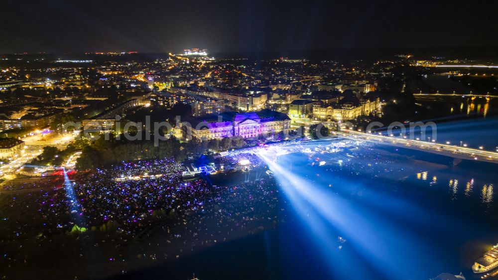 Dresden at night from above - Night lighting music concert on the open-air stage Film Nights on the Elbe - Kaisermania on Wilhelm-Buck-Strasse in Dresden in the state of Saxony, Germany