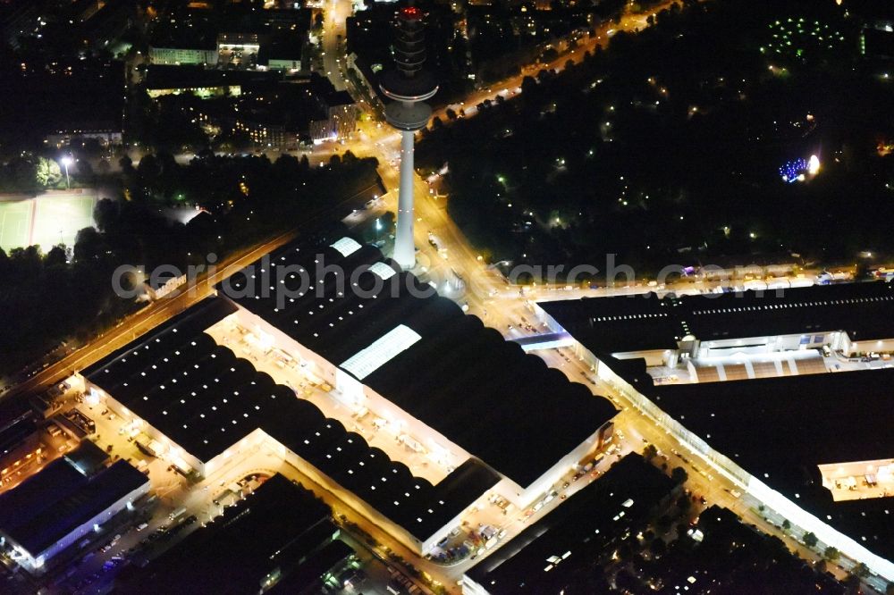 Hamburg at night from above - Night view of tv- tower on Exhibition grounds and exhibition halls of the Hamburg Messe und Congress GmbH in Hamburg