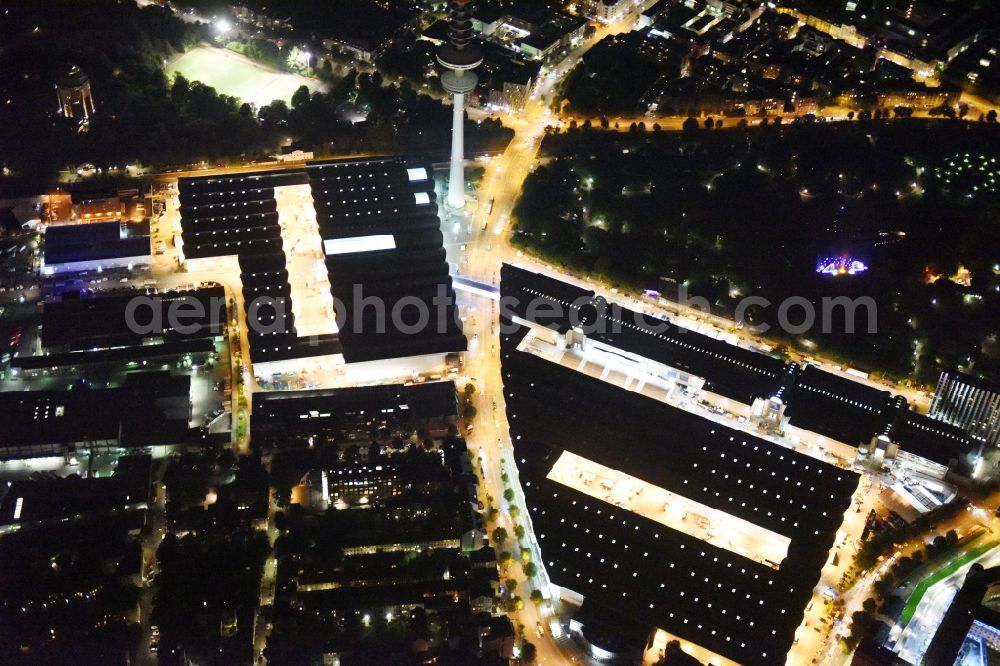 Hamburg at night from above - Night view of tv- tower on Exhibition grounds and exhibition halls of the Hamburg Messe und Congress GmbH in Hamburg