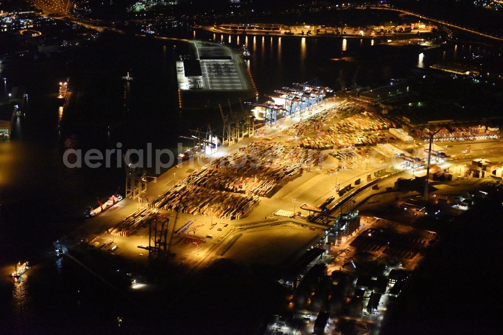 Aerial image at night Hamburg - Night view of Container Terminal in the port of the international port of HHLA Logistics Container Terminal Eurogate in Hamburg