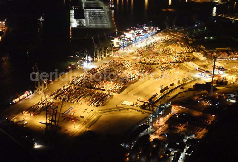 Hamburg at night from above - Night view of Container Terminal in the port of the international port of HHLA Logistics Container Terminal Eurogate in Hamburg