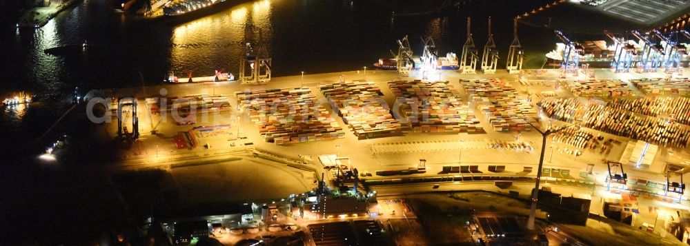 Aerial photograph at night Hamburg - Night view of Container Terminal in the port of the international port of HHLA Logistics Container Terminal Eurogate in Hamburg