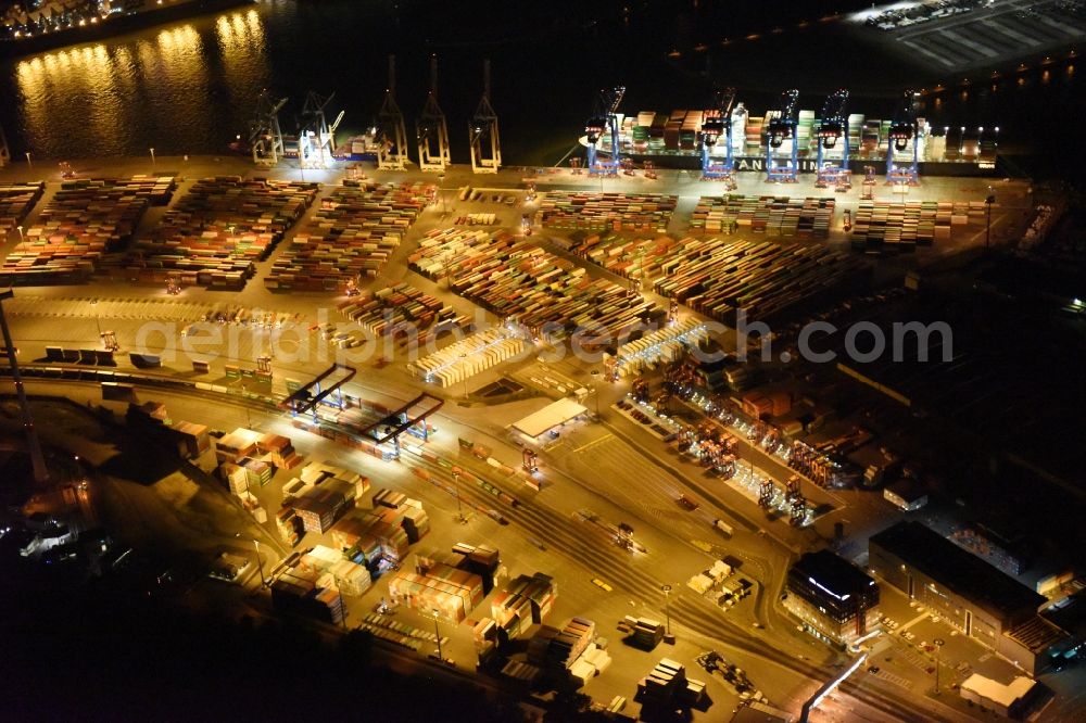 Aerial image at night Hamburg - Night view of Container Terminal in the port of the international port of HHLA Logistics Container Terminal Eurogate in Hamburg