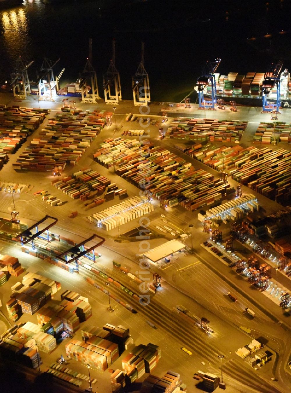 Hamburg at night from above - Night view of Container Terminal in the port of the international port of HHLA Logistics Container Terminal Eurogate in Hamburg