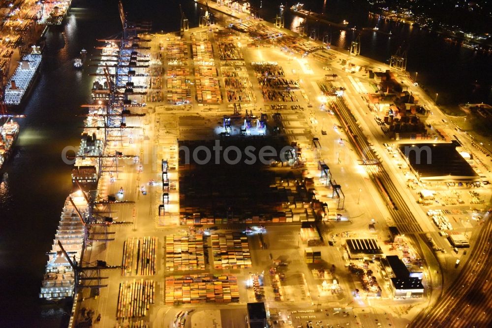 Aerial photograph at night Hamburg - Night view of Container Terminal in the port of the international port of HHLA Logistics Container Terminal Eurogate in Hamburg