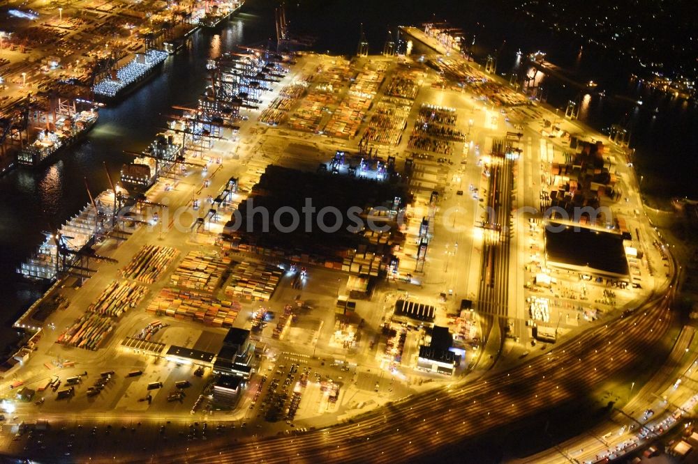 Hamburg at night from above - Night view of Container Terminal in the port of the international port of HHLA Logistics Container Terminal Eurogate in Hamburg