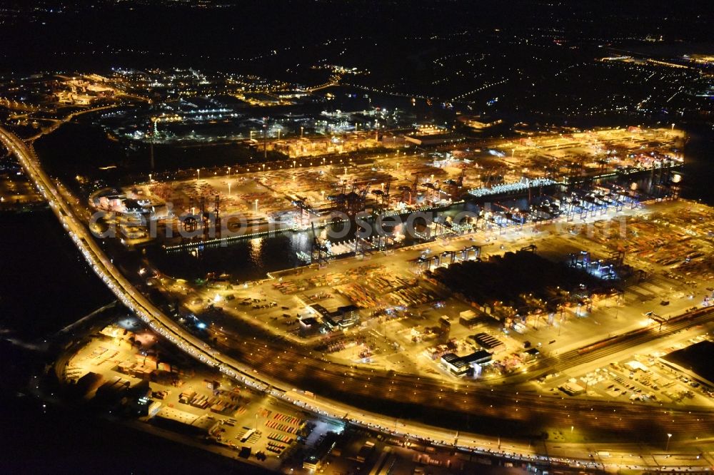 Aerial image at night Hamburg - Night view of Container Terminal in the port of the international port of HHLA Logistics Container Terminal Eurogate in Hamburg