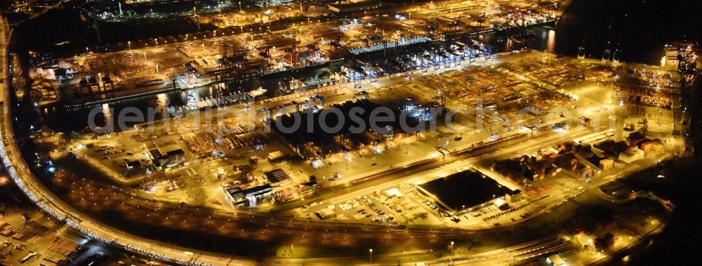 Hamburg at night from above - Night view of Container Terminal in the port of the international port of HHLA Logistics Container Terminal Eurogate in Hamburg