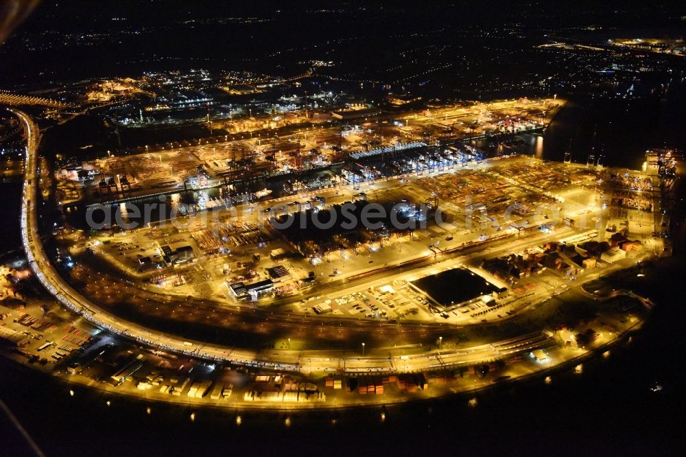 Hamburg at night from the bird perspective: Night view of Container Terminal in the port of the international port of HHLA Logistics Container Terminal Eurogate in Hamburg