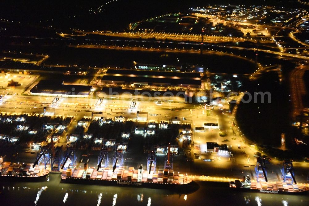 Aerial image at night Hamburg - Night view of Container Terminal in the port of the international port of HHLA Logistics Container Terminal Eurogate in Hamburg