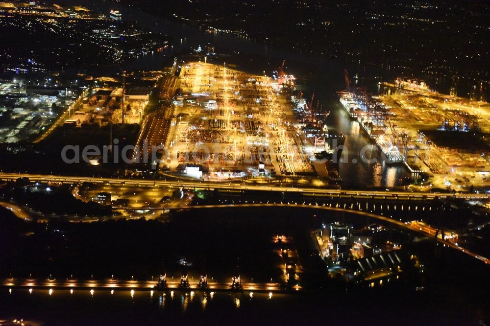 Hamburg at night from above - Night view of Container Terminal in the port of the international port of HHLA Logistics Container Terminal Eurogate in Hamburg