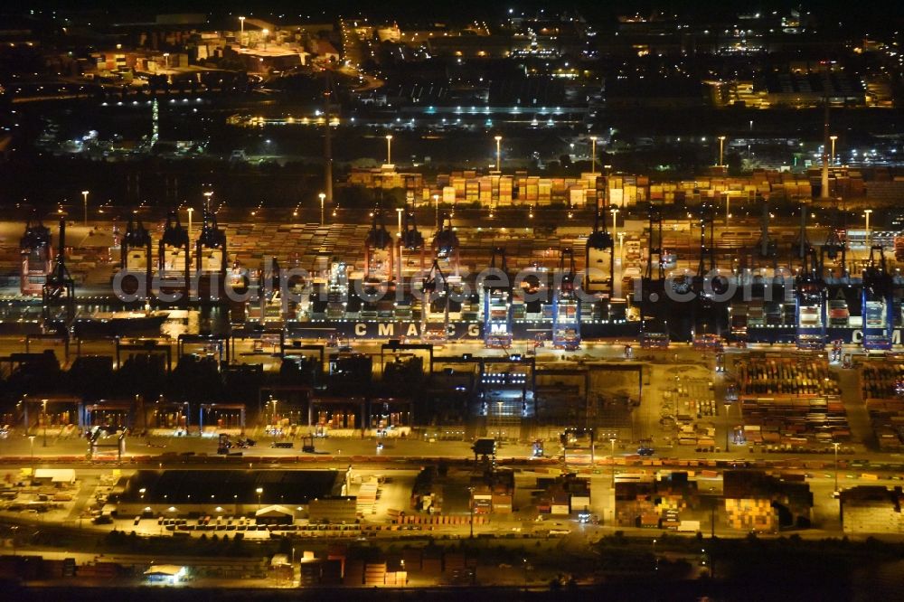 Hamburg at night from above - Night view of Container Terminal in the port of the international port of HHLA Logistics Container Terminal Eurogate in Hamburg