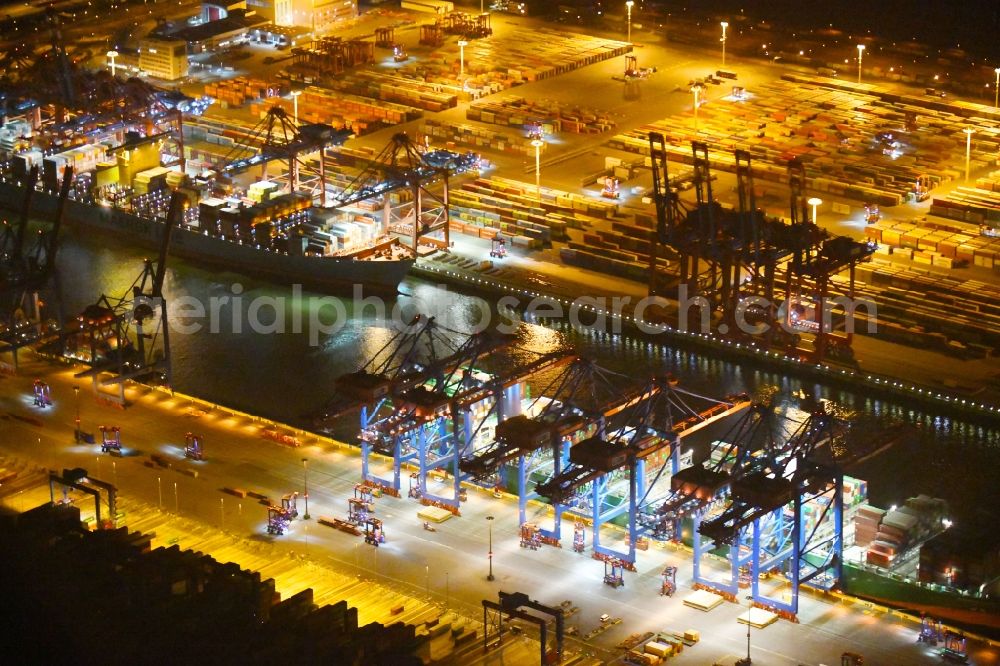 Hamburg at night from above - Night view of Container Terminal in the port of the international port of HHLA Logistics Container Terminal Eurogate in Hamburg