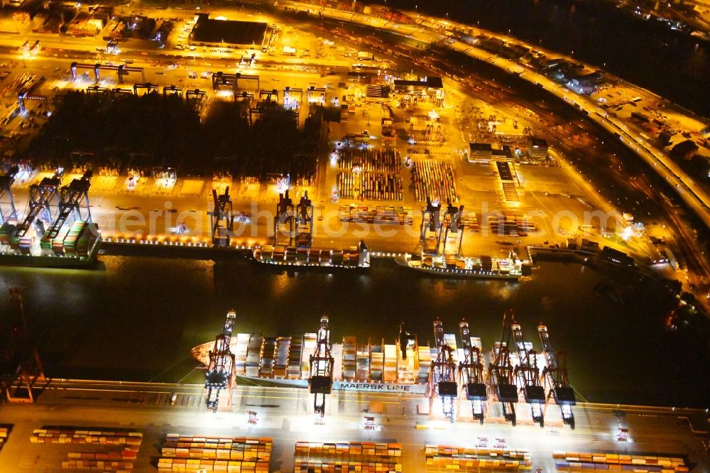 Aerial image at night Hamburg - Night view of Container Terminal in the port of the international port of HHLA Logistics Container Terminal Eurogate in Hamburg