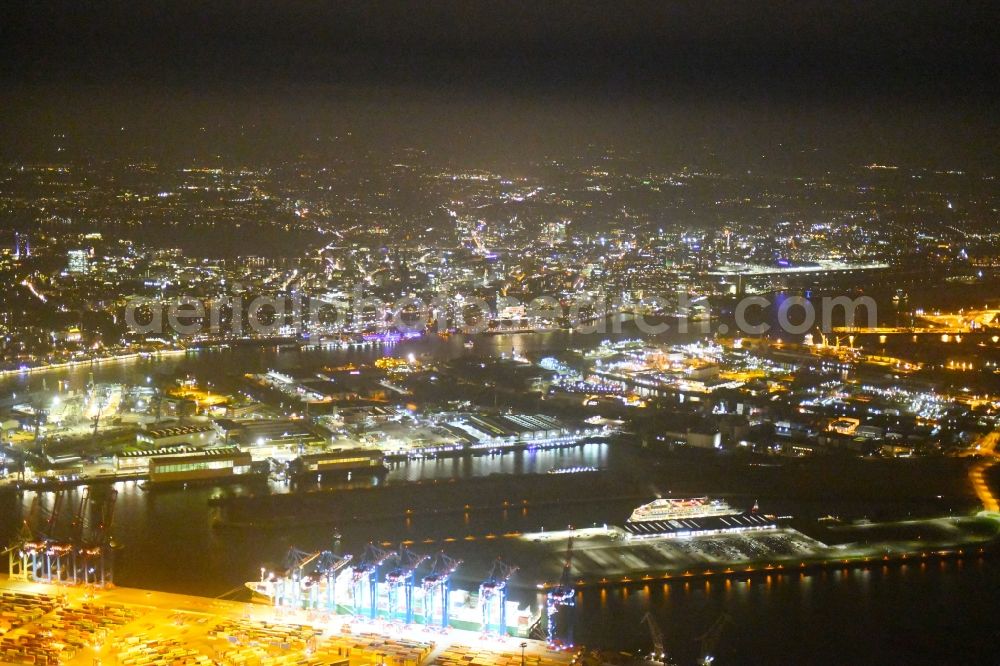 Hamburg at night from the bird perspective: Night view of Container Terminal in the port of the international port of HHLA Logistics Container Terminal Eurogate in Hamburg