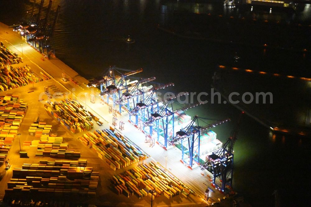 Hamburg at night from above - Night view of Container Terminal in the port of the international port of HHLA Logistics Container Terminal Eurogate in Hamburg