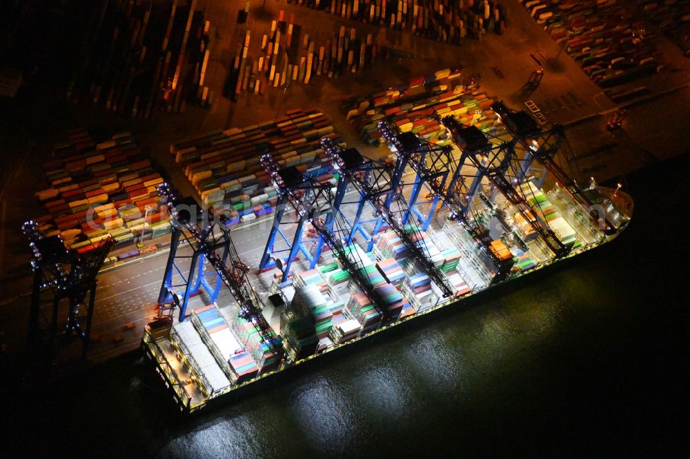 Hamburg at night from above - Night view of Container Terminal in the port of the international port of HHLA Logistics Container Terminal Eurogate in Hamburg